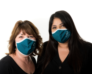 2 women wearing NRAS face masks