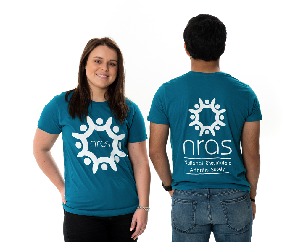 Young man and woman wearing NRAS t-shirts